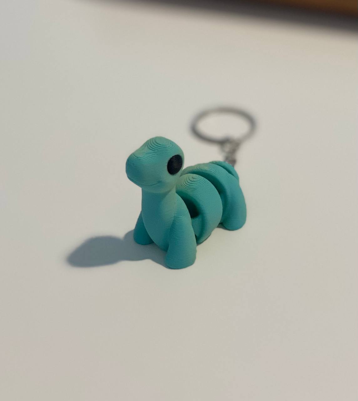 Porte-clés dinosaure diplodocus